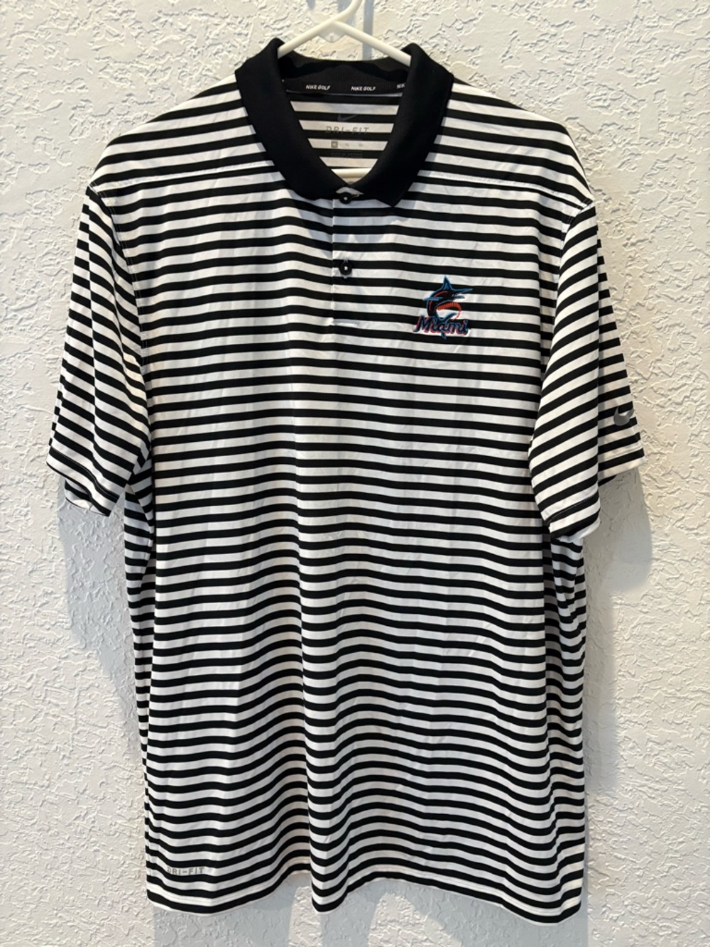 Nike Black & White Striped Polo with Embroidered Miami Marlins Logo